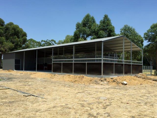 Stables in a line veranda off the front with enclosed area for mare and foal crush to one end , feed and tack room