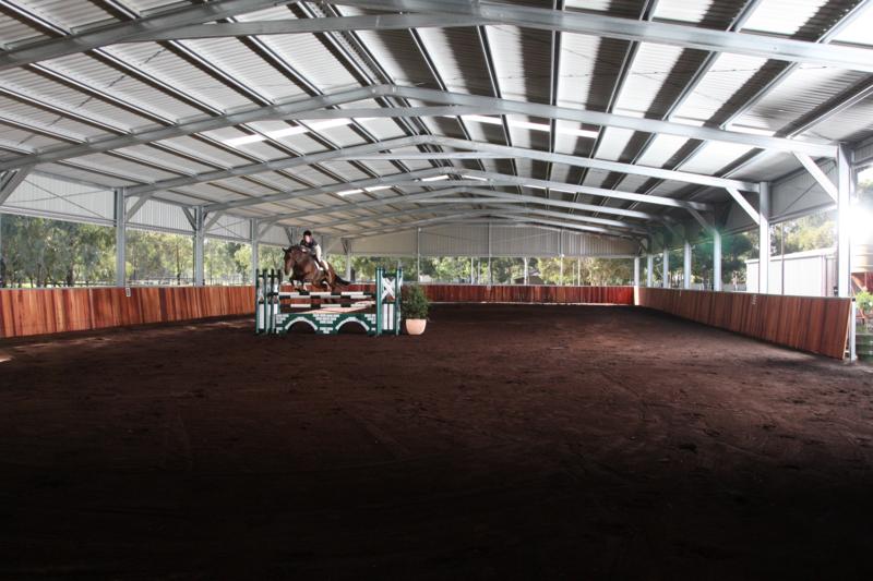 AA Indoor Riding Arena/Wood lined steel enforced on angle sides