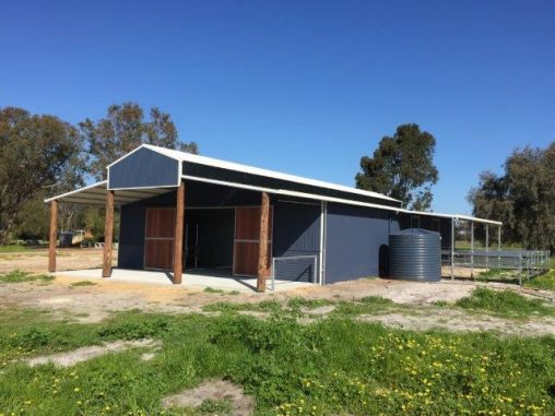 Barn Style Stables with bush poles and Jarrah front doors with covered yards