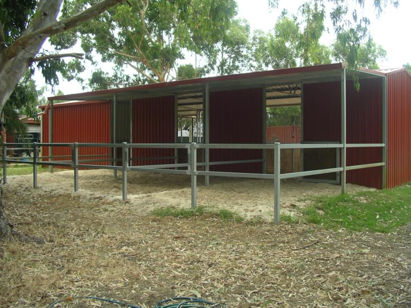 Steel yards 2 rails with gates and roof cover to half the yards off the back of stables
